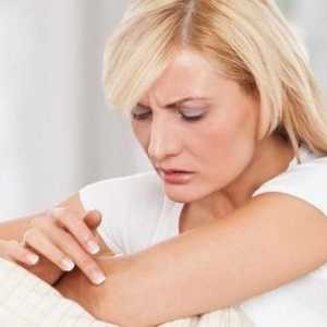 Zakaj luskasta koža na komolcih: Vzroki in zdravljenje